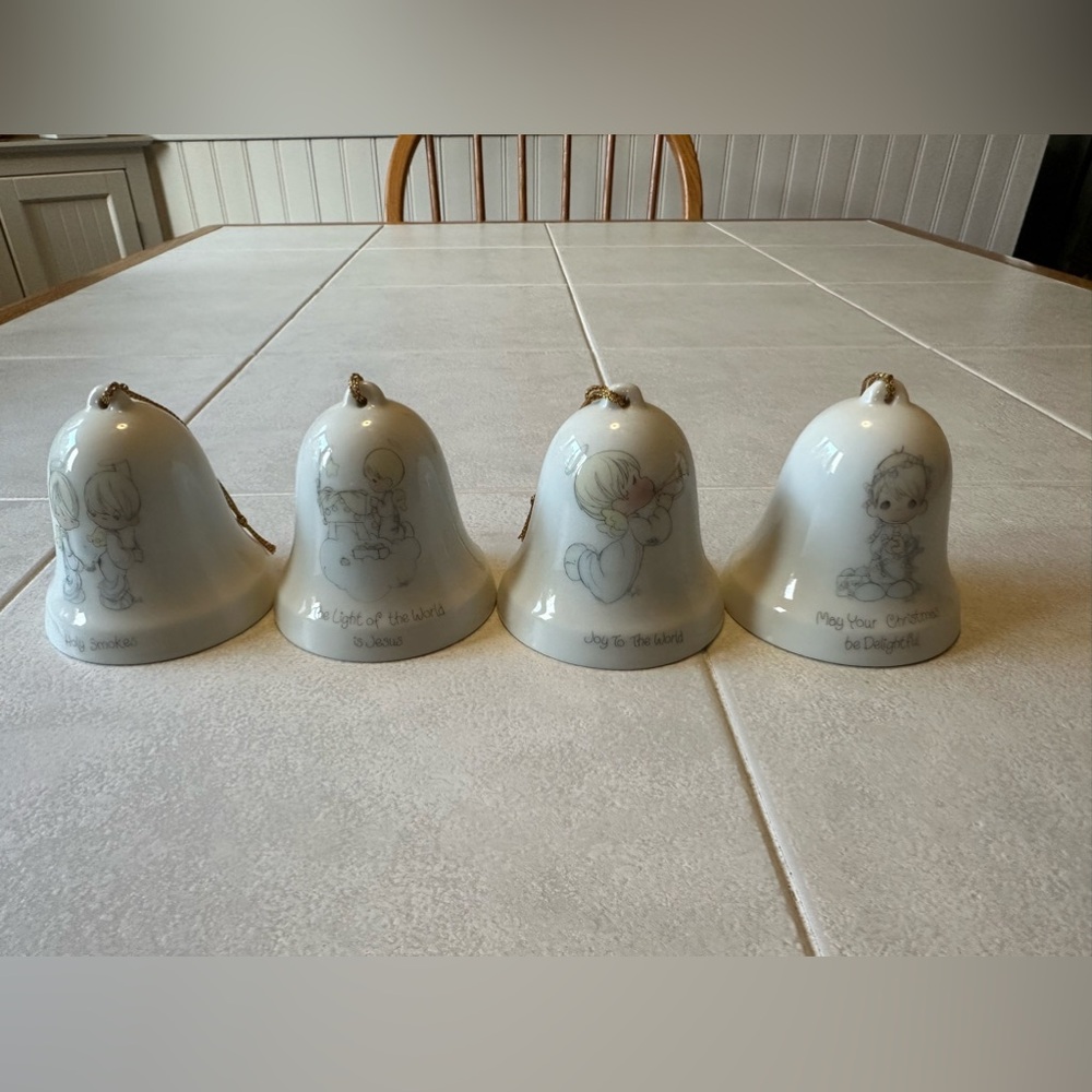Precious Moments set of four bell  Christmas ornaments.